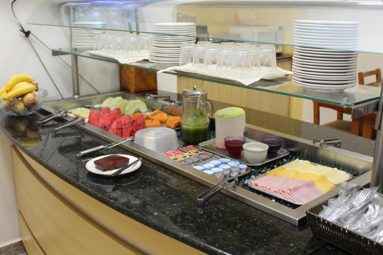 Onix Hotel อัสซิส ภายนอก รูปภาพ